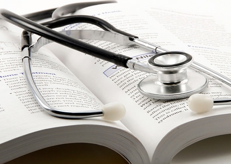 stethoscope on open book